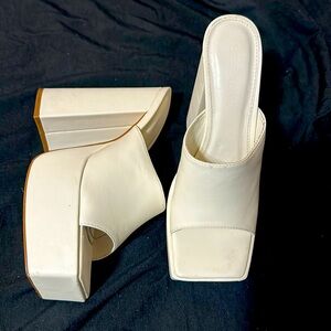 White platform heels